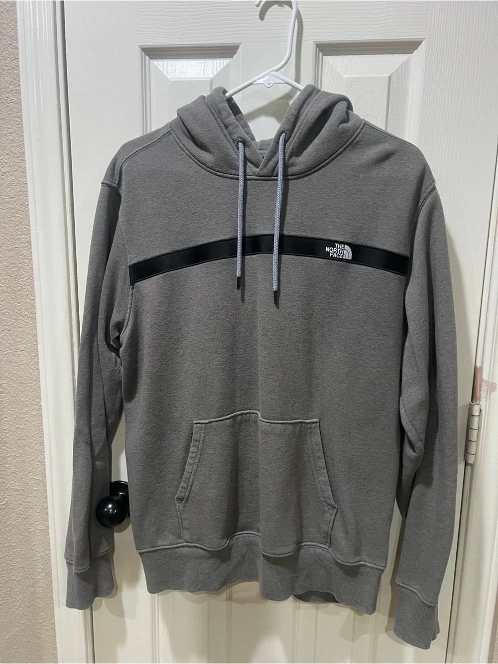 The North Face Gray Pullover Hoodie with Black Chest Stripe
